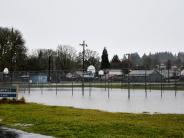 Basketball/tennis courts flooded by rain storm at Campbell Park