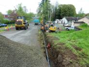 Water line extends down trench in St. Helens