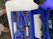 Blue tool case with miscellaneous tools 