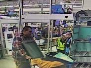 Male suspect two pushing shopping cart out of Walmart 