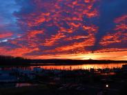 Morning sunrise in St. Helens Riverfront District with views of Mount Hood and Columbia River