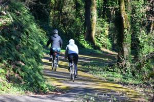 Cyclists on Rutherford Parkway paved path in St. Helens