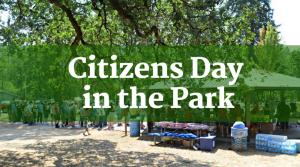 Citizens Day in the Park banner with people lined up at park and a pavilion in background