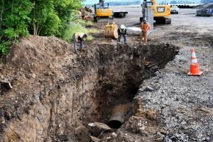 Plymouth Street trench with collapsed bypass pipe at bottom 