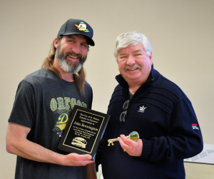 John Brewington and Mayor Scholl Pose With Commemorative Plaque and Key to City