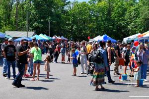 People with vendor rows at Citizens Day in the Park 2023