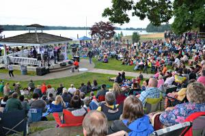 Columbia View Park in summer with people sitting at outdoor amphitheater for concert