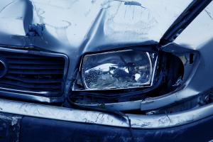 Damaged headlamp on car from auto accident