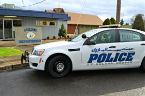 St. Helens police patrol car parked outside police station