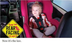 Child in car in rear facing car seat