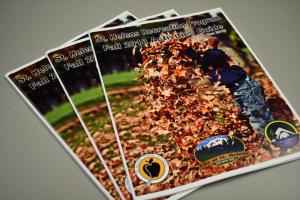 St. Helens Recreation Program activity guides stacked on table